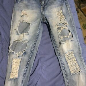 Blue Distressed Boyfriend Jeans with Ripped Knees